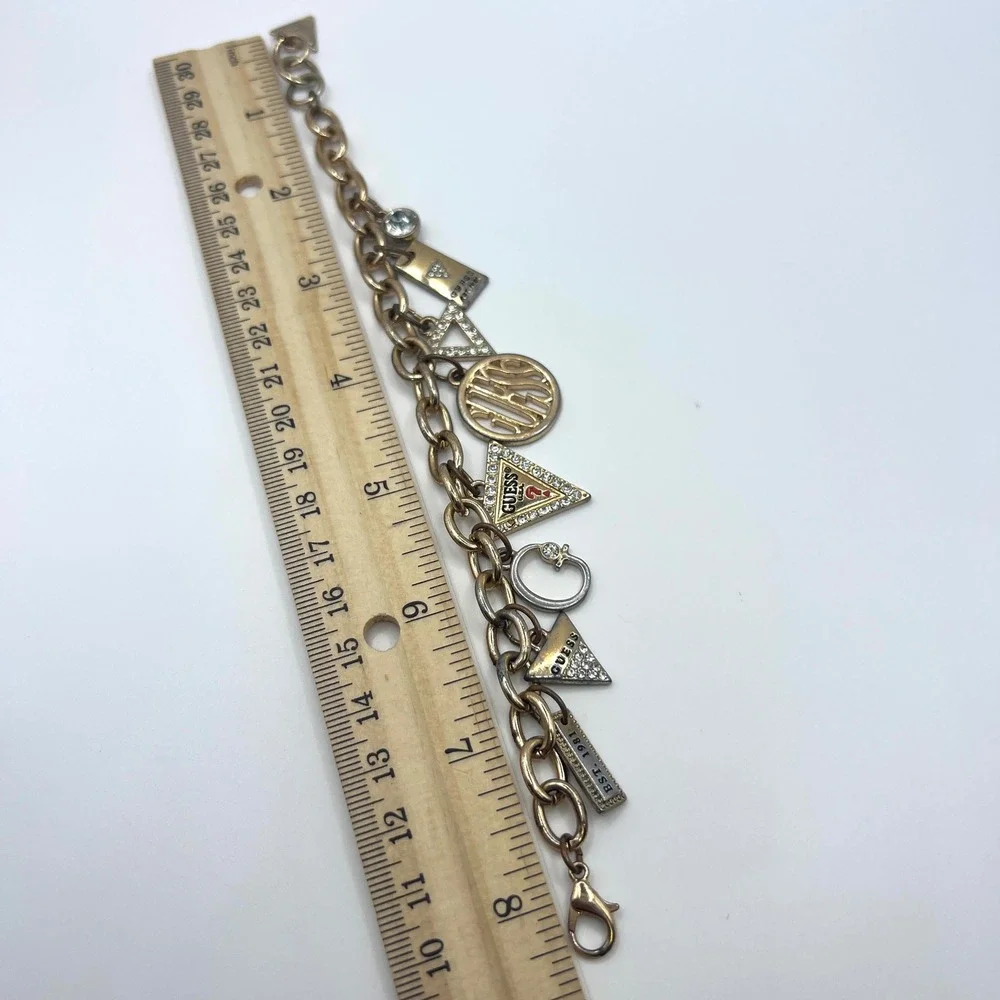 GUESS Vintage Gold Tone Charm Bracelet Rhinestone Logo Est 1981 Y2K Signed